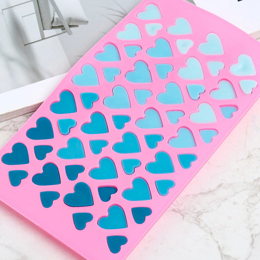 Molde de silicona en forma de corazón con 56 compartimentos - Jabones Artesanales