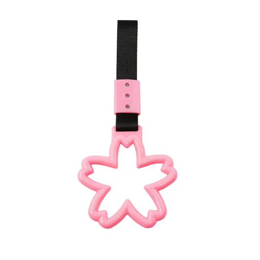 Strap decorativo para autos en forma de sakura 🚗🌸