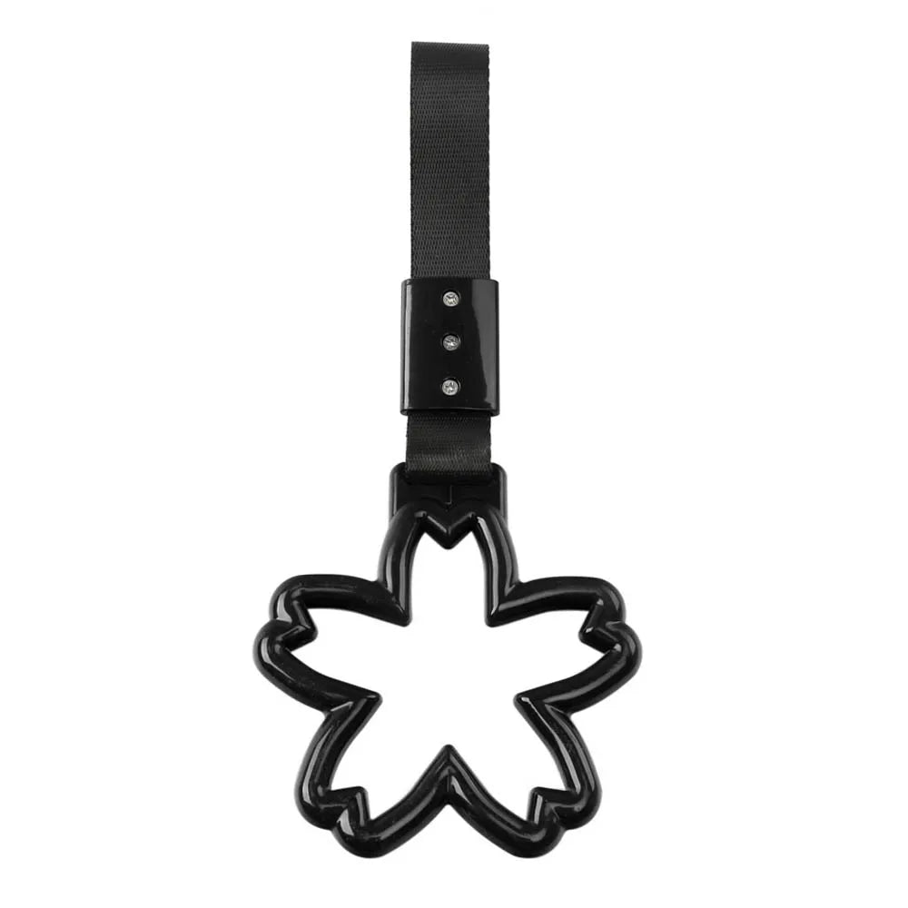 Strap decorativo para autos en forma de sakura 🚗🌸