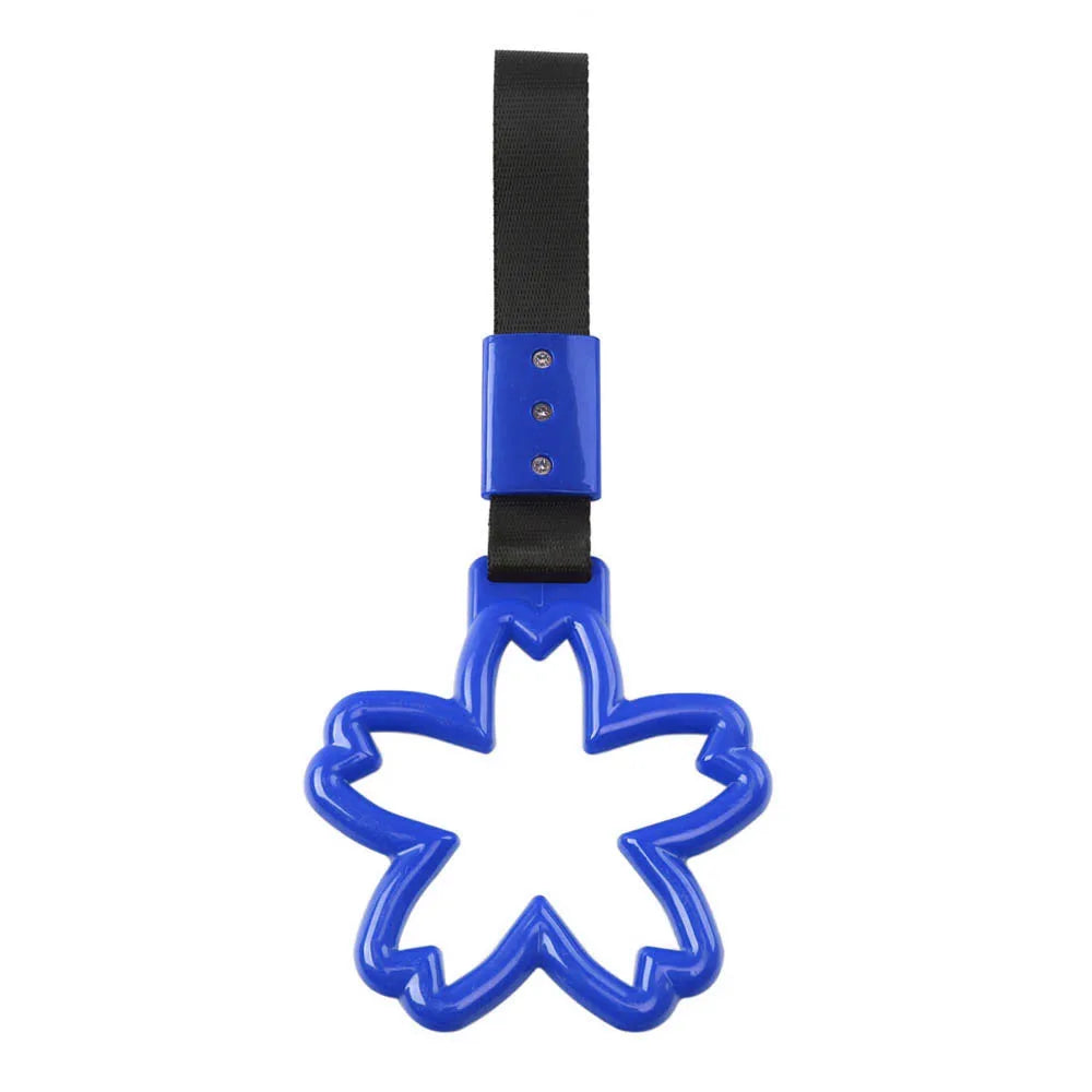 Strap decorativo para autos en forma de sakura 🚗🌸