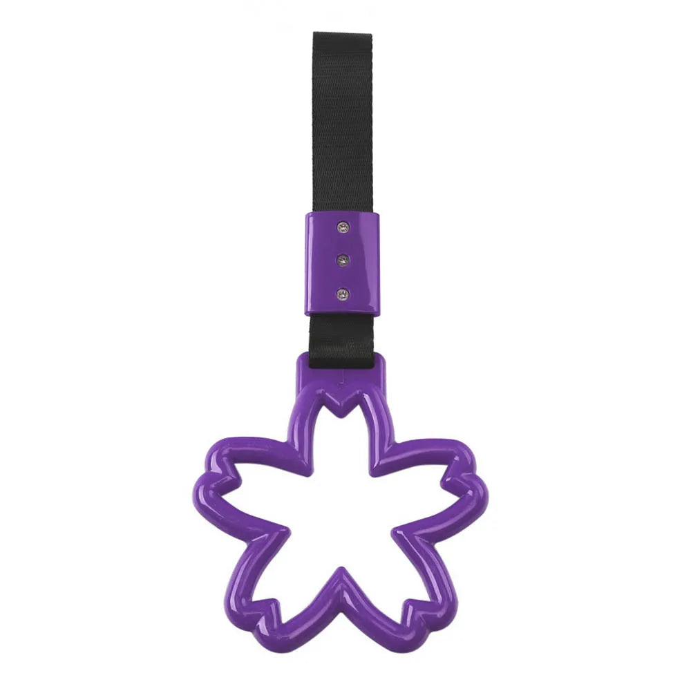 Strap decorativo para autos en forma de sakura 🚗🌸