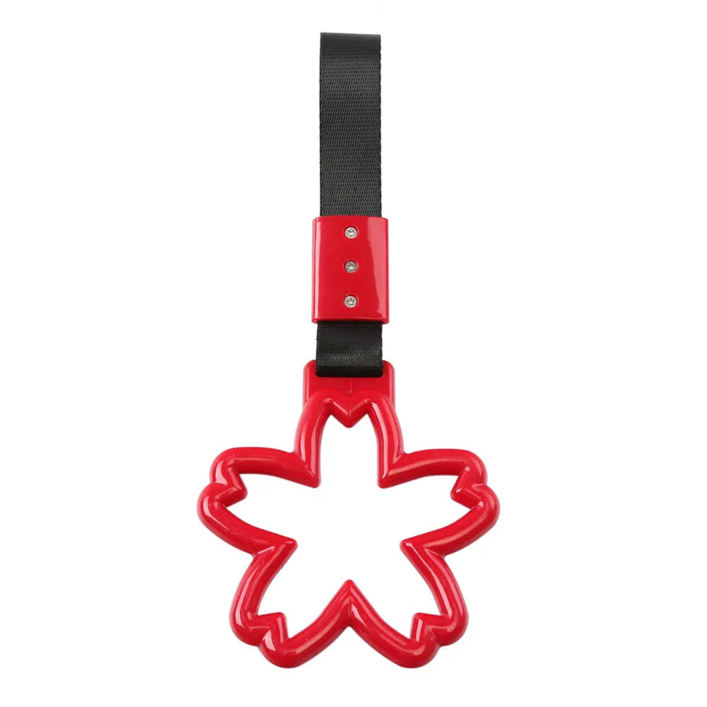 Strap decorativo para autos en forma de sakura 🚗🌸